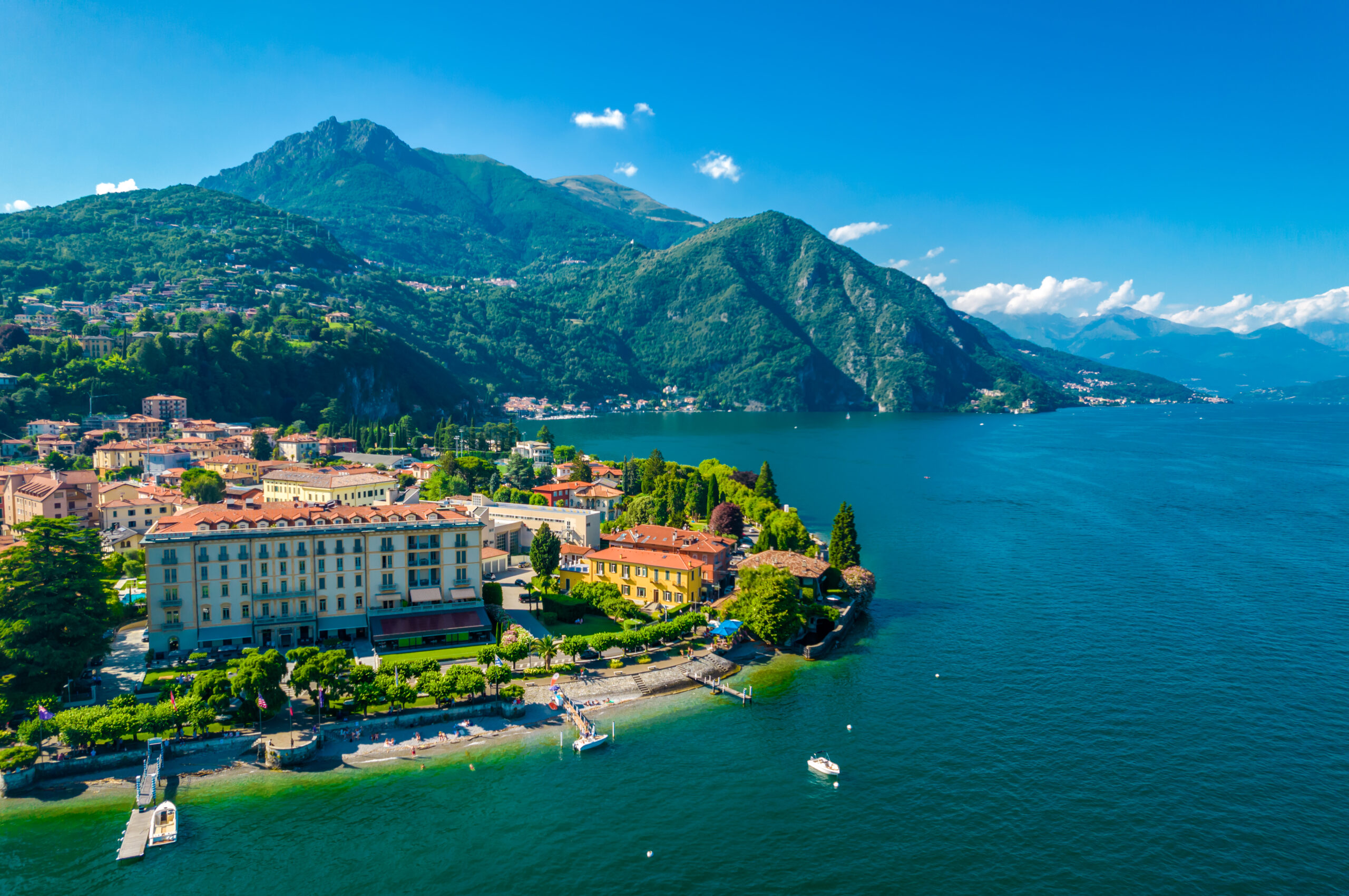 Menaggio, Como Lake. Aerial panoramic view Menaggio town surrounded by mountains and located in Como Lake, Lombardy, Italy